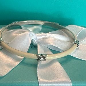- Tiffany & Co Cream (Beige) Enamel Sterling Silver Signature X Bangle Bracelet